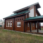 фото: покраска клееного бруса